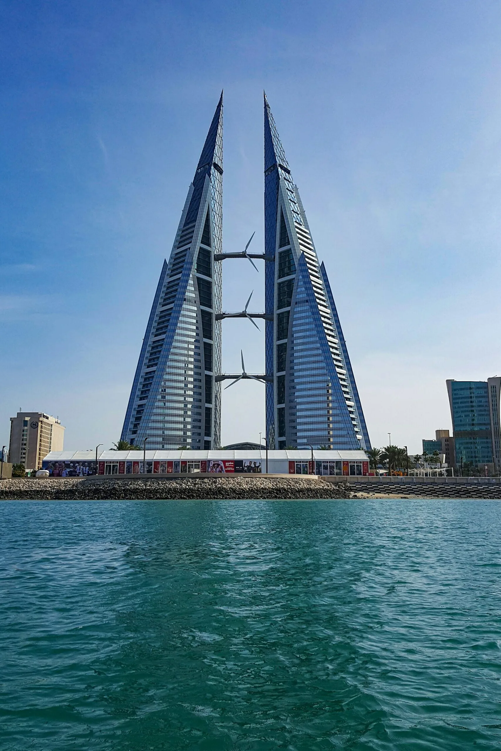 Manama, Bahrain's World Trade Center as viewed across the water by day.